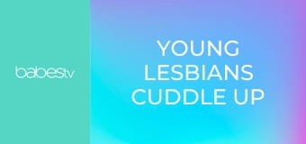 Young lesbians cuddle up together E1382