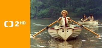 Velký blondýn s černou botou